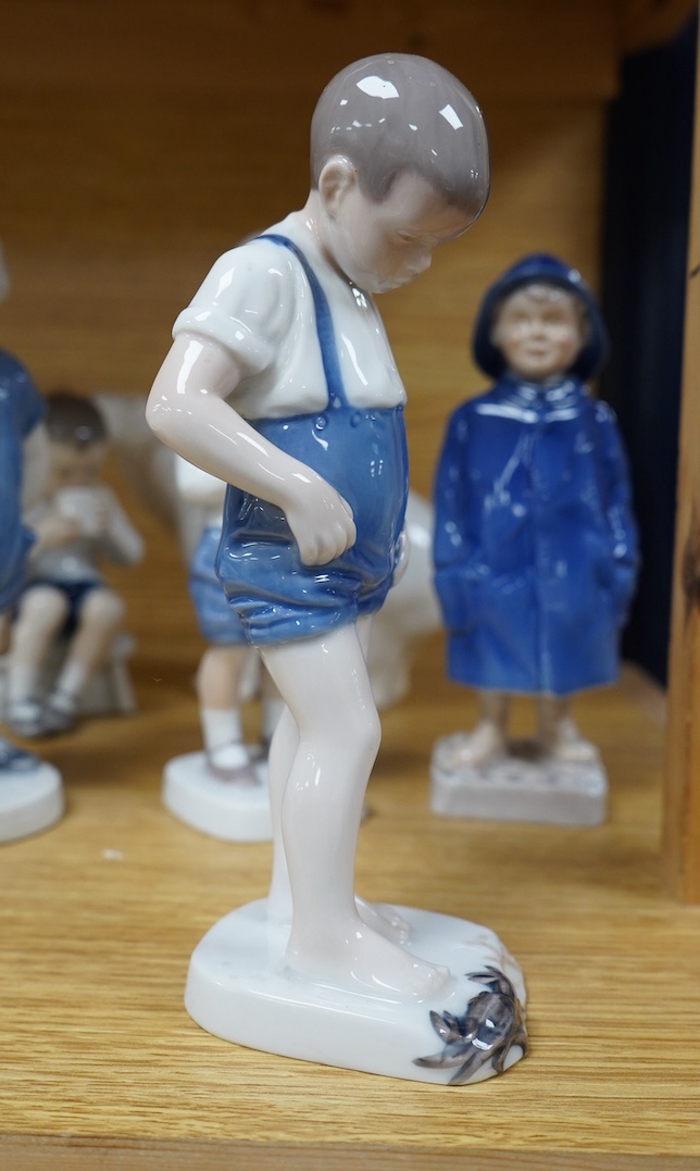 Six Royal Copenhagen or B & G figures of children and a polar bear, tallest 19.5cm. Condition - good.